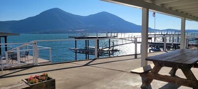 Lakefront home with patio, private boat dock and fishing pier
