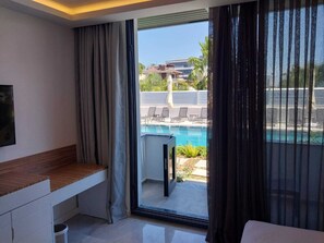 Chambre triple Deluxe, Plusieurs lits | Vue de la chambre