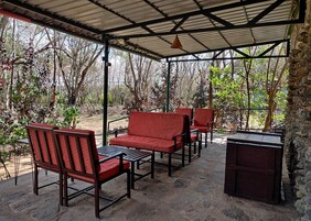 Quarto casal luxo | Área de estar