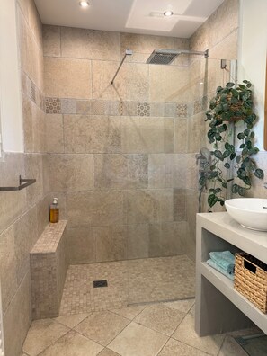 Shower, hair dryer, towels, soap