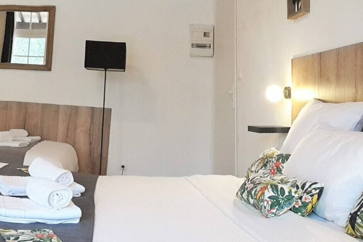Premium bedding, desk, blackout curtains, soundproofing