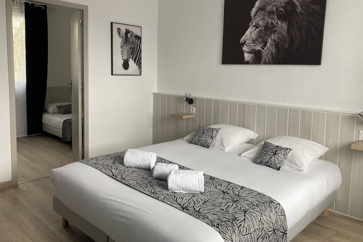 Premium bedding, desk, blackout curtains, soundproofing