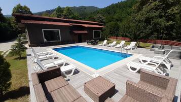 Outdoor pool, open 10:00 AM to 6:00 PM, free cabanas, pool umbrellas