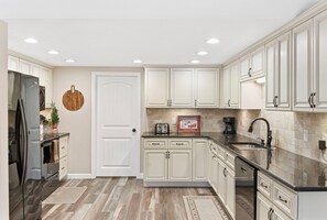 Fridge, microwave, oven, stovetop - Lakefront Fishing Retreat | Private Dock, Kayaks, Hot Tub & Ping Pong | Min to Branson Landing (Hollister)