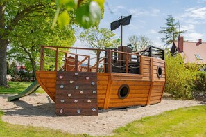 Children’s area - Holiday homes with fireplace , summer pool (Darlowo)