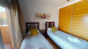 2 dormitorios, tabla de planchar con plancha, wifi gratis y ropa de cama