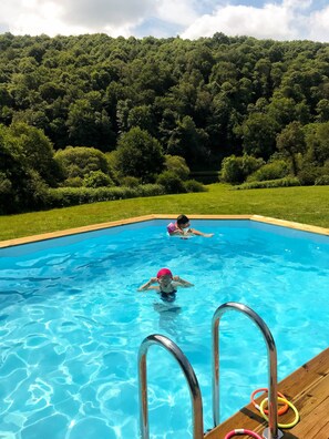 Alberca al aire libre y alberca climatizada