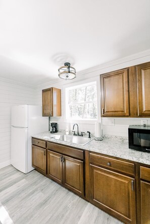 Fridge, coffee/tea maker, cookware/dishes/utensils - #1 Cabin at Red Oak Valley (Canaan Township)