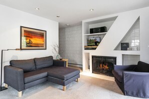 Condo, 2 Bedrooms | Living room | Flat-screen TV
