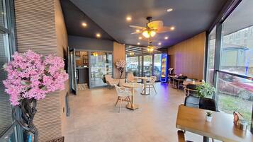 55-inch flat-screen TV with satellite channels, TV