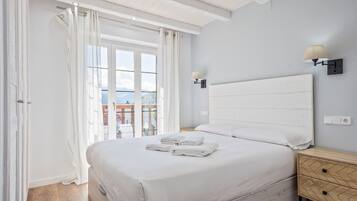 1 dormitorio, tabla de planchar con plancha, Internet y ropa de cama