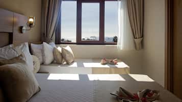 Luxury Triple Room | Premium bedding, desk, laptop workspace, iron/ironing board