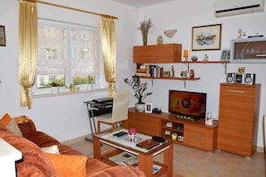Apartment, 1 Queen-Bett und Schlafsofa | Wohnzimmer