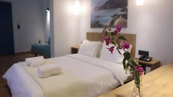 Family Quadruple Room, Patio, Courtyard View | Egyptian cotton sheets, premium bedding, down comforters