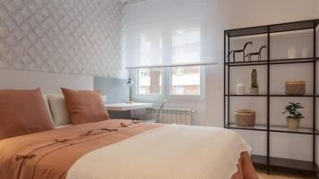 Economy Room | 1 bedroom, iron/ironing board, free WiFi, bed sheets