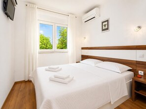 4 slaapkamers, een strijkplank/strijkijzer, wifi, beddengoed