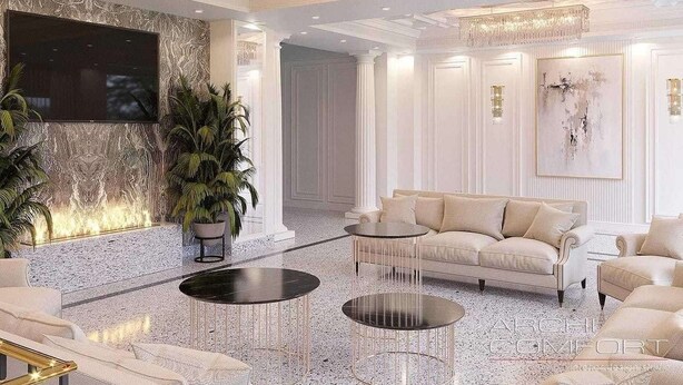 A luxurious lobby with a marble floor, a sofa set, a TV mounted on the wall, and a chandelier. - Anga Yerevan Hotel (Yerevan)