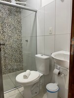 Shower, rainfall showerhead, towels, soap