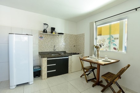 Family Room | Private kitchen | Fridge, blender, cookware/dishes/utensils, dining tables