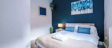 4 bedrooms, iron/ironing board, travel cot, WiFi