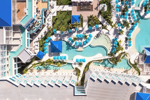 3 outdoor pools, open 7:00 AM to 7:00 PM, cabanas (surcharge)