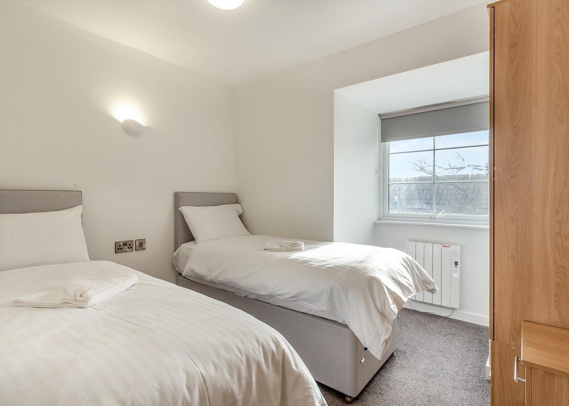 Apartamento | 2 quartos, Wi-Fi de cortesia, roupa de cama