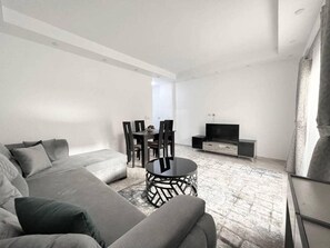 Apartment, 2 Queen-Betten | Wohnzimmer