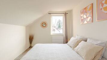 1 bedroom, desk, iron/ironing board, travel crib