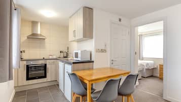 Apartment | Private kitchen | Fridge, microwave, oven, stovetop