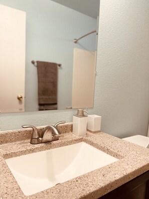 Combined shower/bathtub