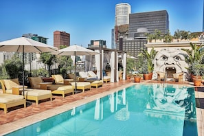 Outdoor pool, open 7:00 AM to 10:00 PM, cabanas (surcharge)