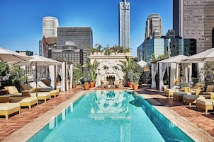 Outdoor pool, open 7:00 AM to 10:00 PM, cabanas (surcharge)