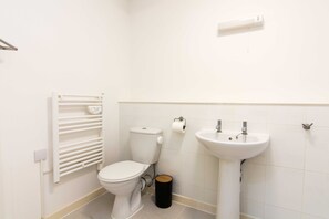 Apartment, Multiple Beds | Bathroom | Combined shower/tub, deep soaking tub, hair dryer, towels - Fremington Court, Coventry - 2 Bedroom Apartment (Coventry)
