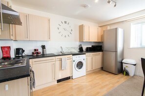 Apartment, Multiple Beds | Private kitchen | Fridge, microwave, stovetop, electric kettle - Fremington Court, Coventry - 2 Bedroom Apartment (Coventry)