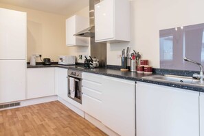 Apartment, Multiple Beds | Private kitchen | Fridge, microwave, stovetop, electric kettle - 615 Prosperity House, Derby - 2 Bedroom Apartment (Derby)