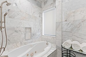 Bathtub, jetted bath, hair dryer, bidet