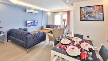 Classic Apartment | Living area | 32-inch Smart TV with satellite channels, TV