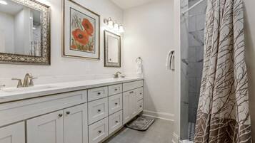 Bathtub, hair dryer, towels