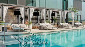 Seasonal outdoor pool, cabanas (surcharge), pool umbrellas