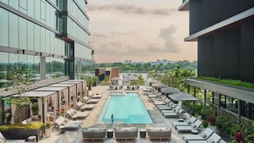 Seasonal outdoor pool, pool cabanas (surcharge), pool umbrellas