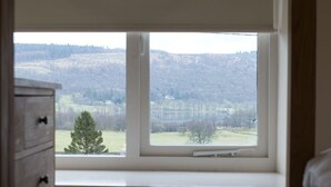 A room with a window overlooking a landscape. - Poppy Cottage, village cottage with lake views (Coniston)