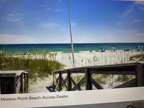 On the beach, sun loungers, beach towels