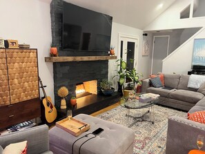 Smart TV, fireplace, foosball