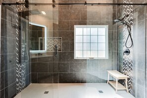 Combined shower/tub, hair dryer, towels, soap