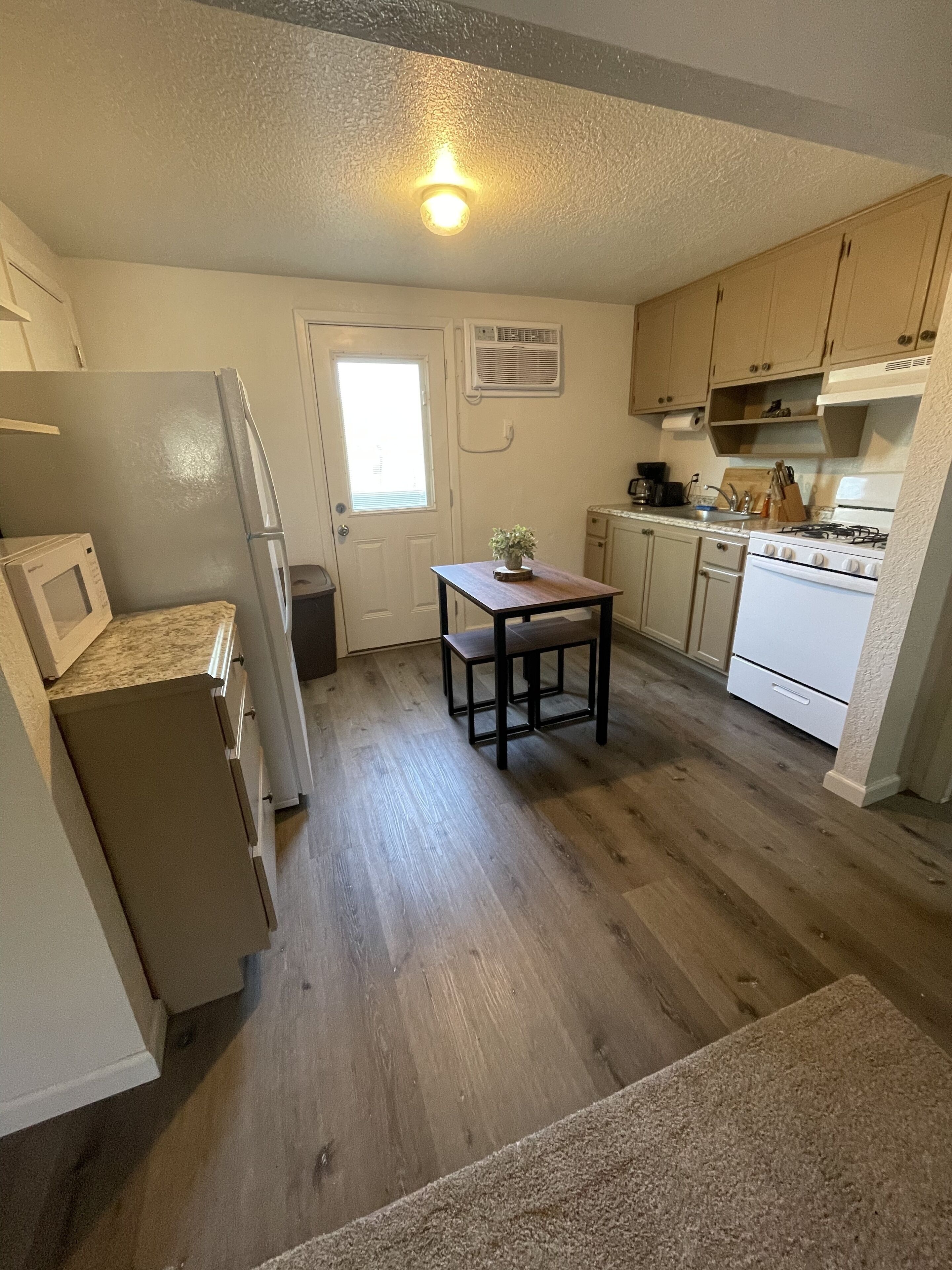 Studio | Private kitchen | Full-size fridge, microwave, oven, stovetop