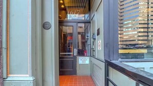A fire command center entrance with a sign indicating its location on 1617 California St. - NEW LISTING Charming 2/2 loft/heart of downtown. 5 min walk Convention Center (Denver)