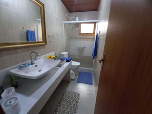 Shower, towels, soap, toilet paper
