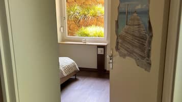 1 dormitorio, tabla de planchar con plancha, wifi gratis y ropa de cama