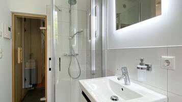 Shower, hair dryer, towels