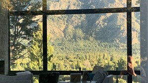 A modern interior with large windows offering a mountain view. - New Modern Home, Golf, Polo, Few Minutes From Catedral Ski Resort.  (San Carlos de Bariloche)